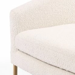 FOUR HANDS CORBIN CREAM BOUCLE + BRASS ACCENT CHAIR