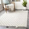 SURYA AZA POM INDOOR-OUTDOOR RUG: IVORY