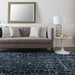 SURYA MIDNIGHT MOON WOOL RUG: NAVY