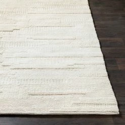 SURYA KOBY BRAIDED WOOL RUG