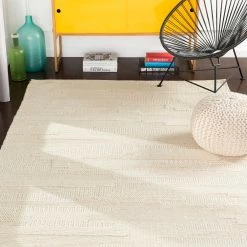 SURYA KOBY BRAIDED WOOL RUG