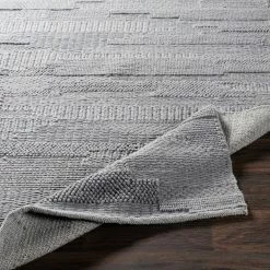 SURYA KOBY BRAIDED WOOL RUG