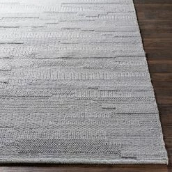 SURYA KOBY BRAIDED WOOL RUG