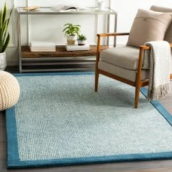 SURYA HAND TUFTED WOOL BORDER RUG: BLUE