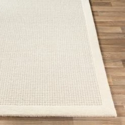SURYA HAND TUFTED WOOL BORDER RUG: CREAM
