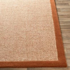 SURYA HAND TUFTED WOOL BORDER RUG: RUST