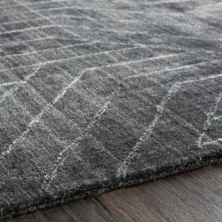 SURYA AKIDO VISCOSE RUG: CHARCOAL