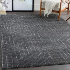 SURYA AKIDO VISCOSE RUG: CHARCOAL