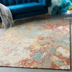 SURYA ARTSCAPE WOOL RUG: RUST, AQUA