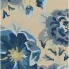 SURYA IN BLOOM OUTDOOR RUG: BLUE, KHAKI