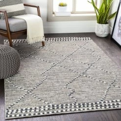 SURYA RAYME INDOOR-OUTDOOR RUG: GREY + CHARCOAL