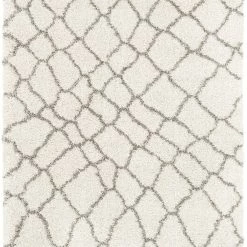 SURYA Rug JAKOBA SHAG: IVORY