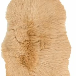 SURYA SHEEPSKIN HIDE RUG: CAMEL