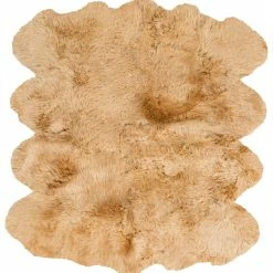 SURYA SHEEPSKIN HIDE RUG: CAMEL