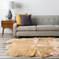 SURYA SHEEPSKIN HIDE RUG: CAMEL