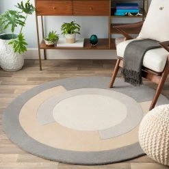 SURYA SPINNER ROUND WOOL RUG: GRAY, KHAKI