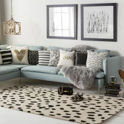 SURYA TREND SPOTTING WOOL RUG: BEIGE, BLACK