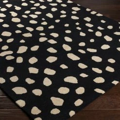 SURYA TREND SPOTTING WOOL RUG: BLACK