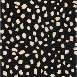 SURYA TREND SPOTTING WOOL RUG: BLACK