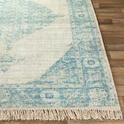 SURYA NORA DISTRESSED VINTAGE PRINT RUG: AQUA