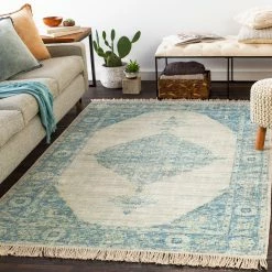 SURYA NORA DISTRESSED VINTAGE PRINT RUG: AQUA